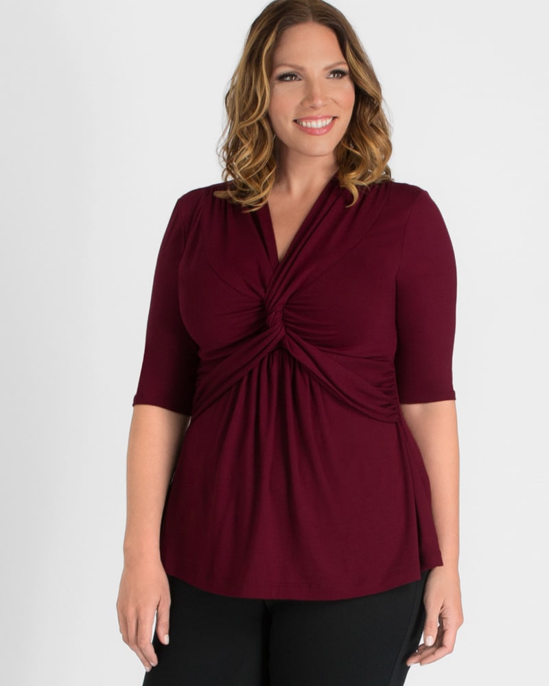 Front of a model wearing a size 0X Hannah Twist Top in BURGUNDY by Kiyonna. | dia_product_style_image_id:220293